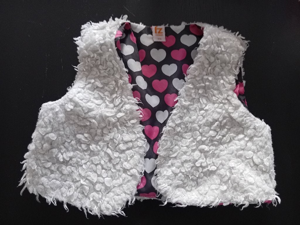 x een wollig vestjemet hartjes er in, Ophalen, Gebruikt, Meisje, Trui of Vest