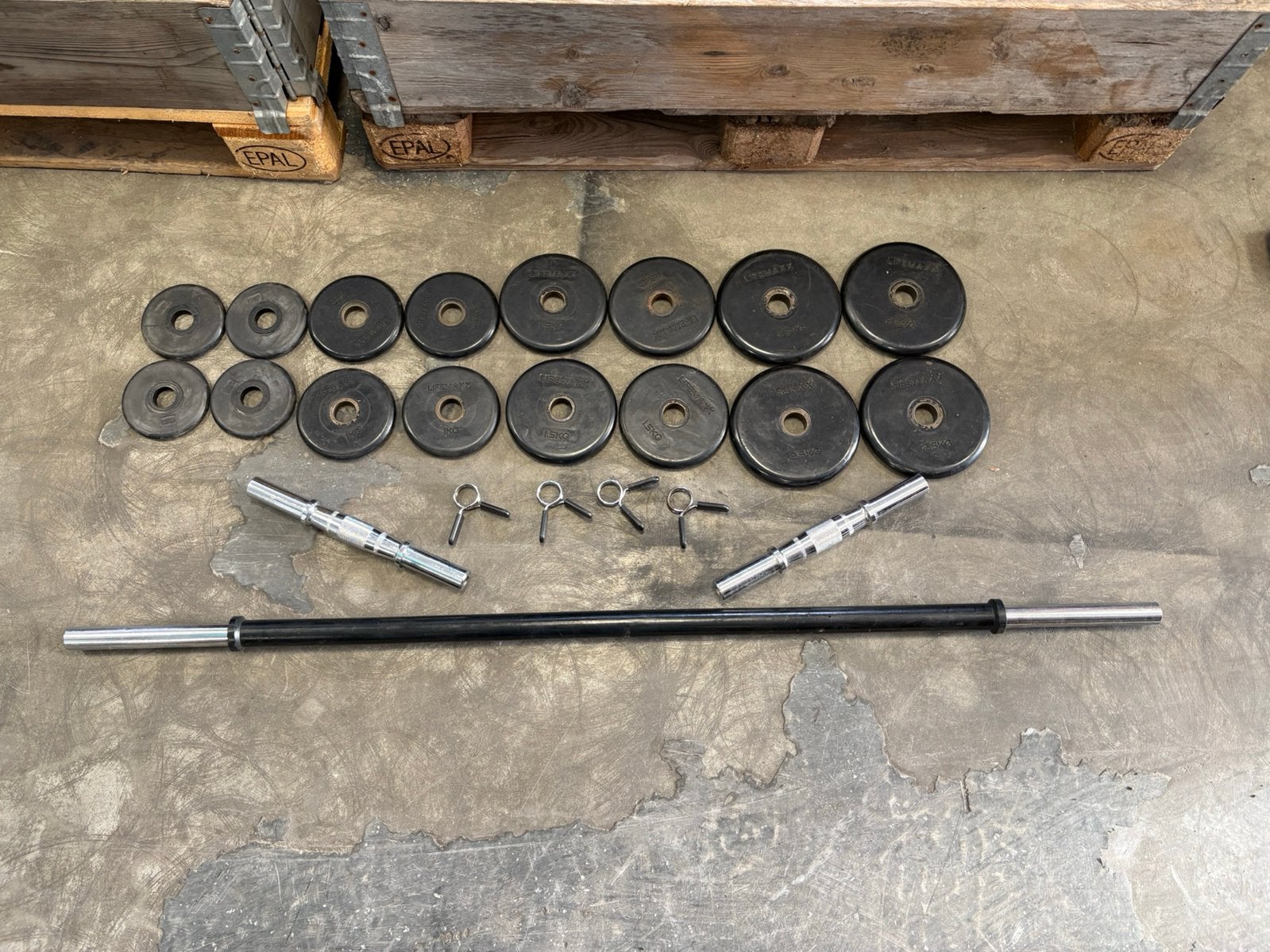 Complete halter set schijven stang dumbbells