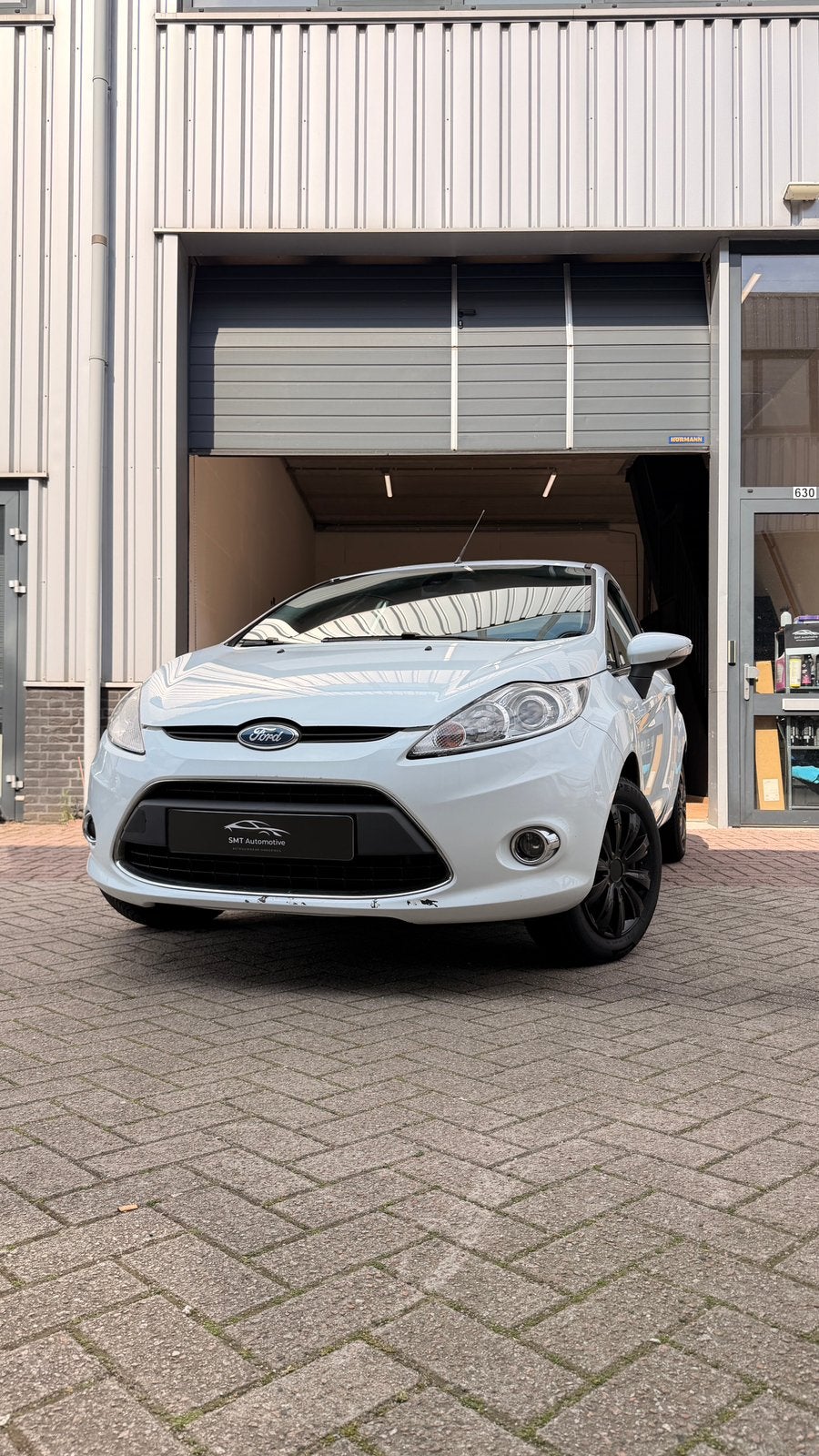 Ford Fiësta 1.25 60KW 3DR 2010 Wit, Auto's, Voorwielaandrijving, Stof, 600 kg, 4 cilinders