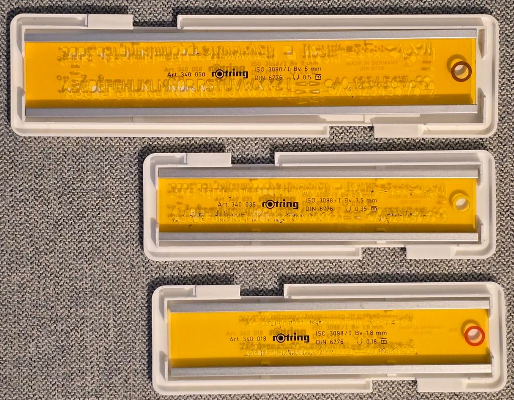 Rotring lettersjablonen set (3 stuks) met metalen rand, Ophalen of Verzenden, Zo goed als nieuw