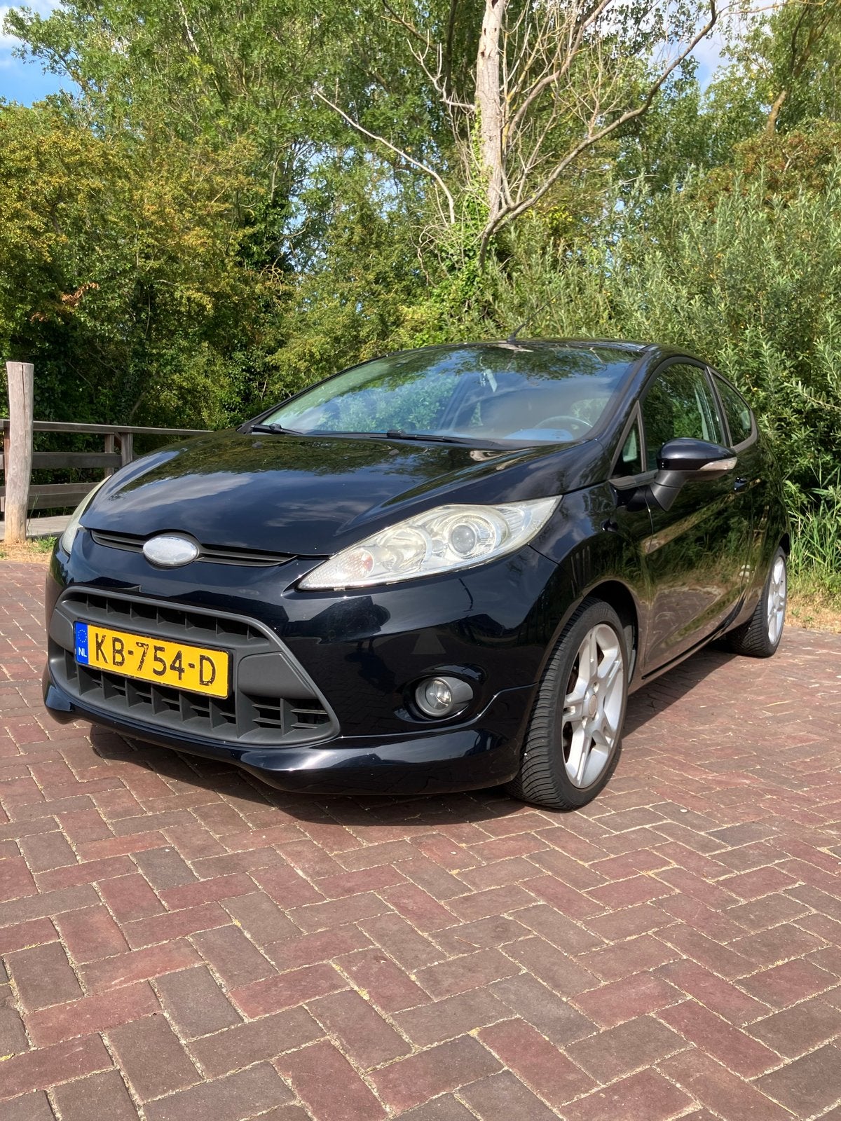 Ford Fiësta 1.4 Sport 71KW 3DR 2010 Zwart, Auto's, Voorwielaandrijving, Stof, 31 €/maand, 4 cilinders