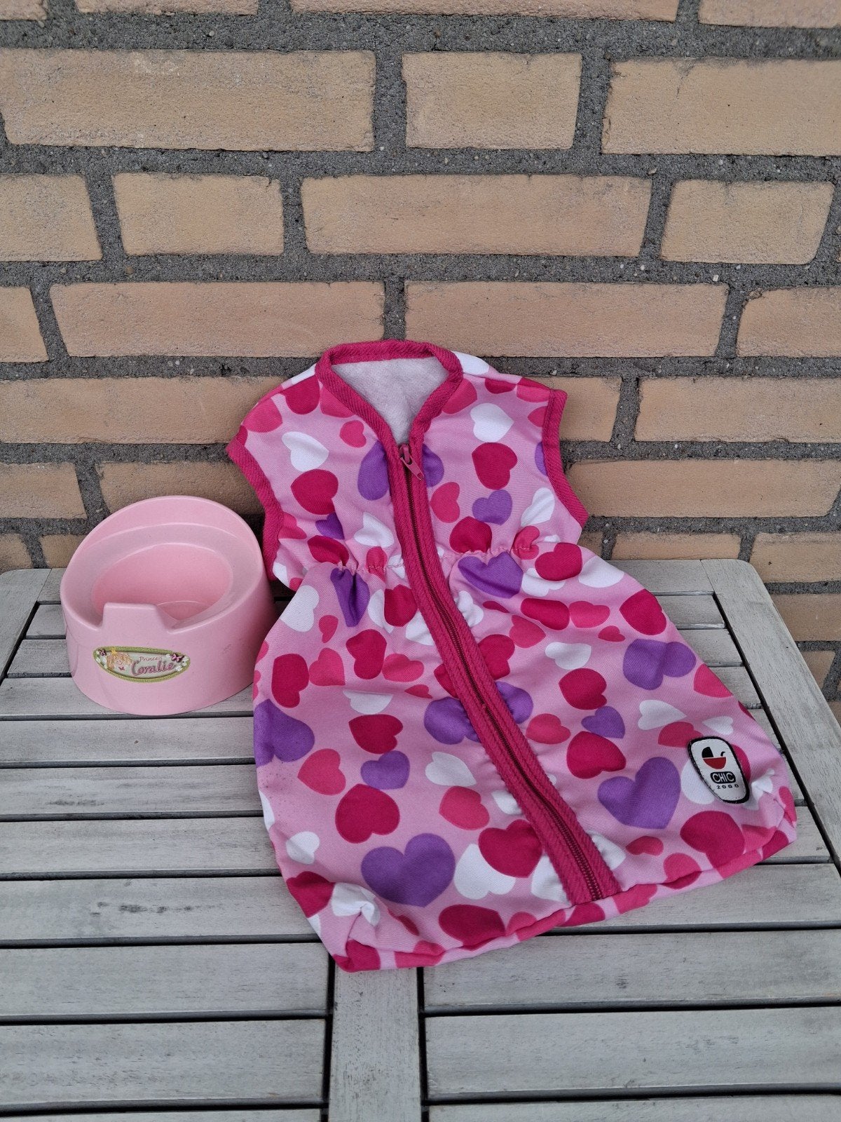 Roze slaapzak met hartjespatroon met poppenpotje., Ophalen of Verzenden, Zo goed als nieuw, Roze, Slaapzak