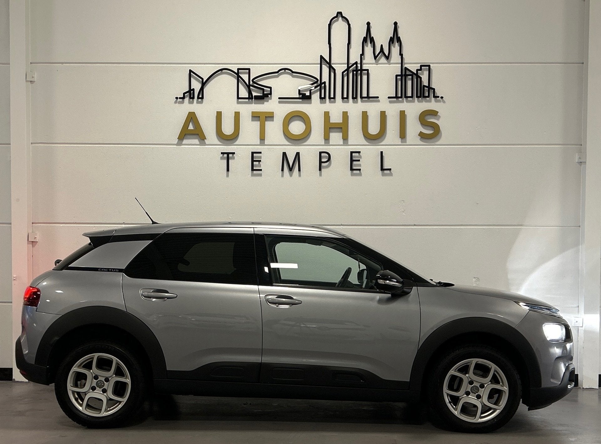 Citroen C4 Cactus 1.2 PureTech Shine Automaat Airco Camera C, Auto's, Stof, Gebruikt, Bedrijf, 3 cilinders