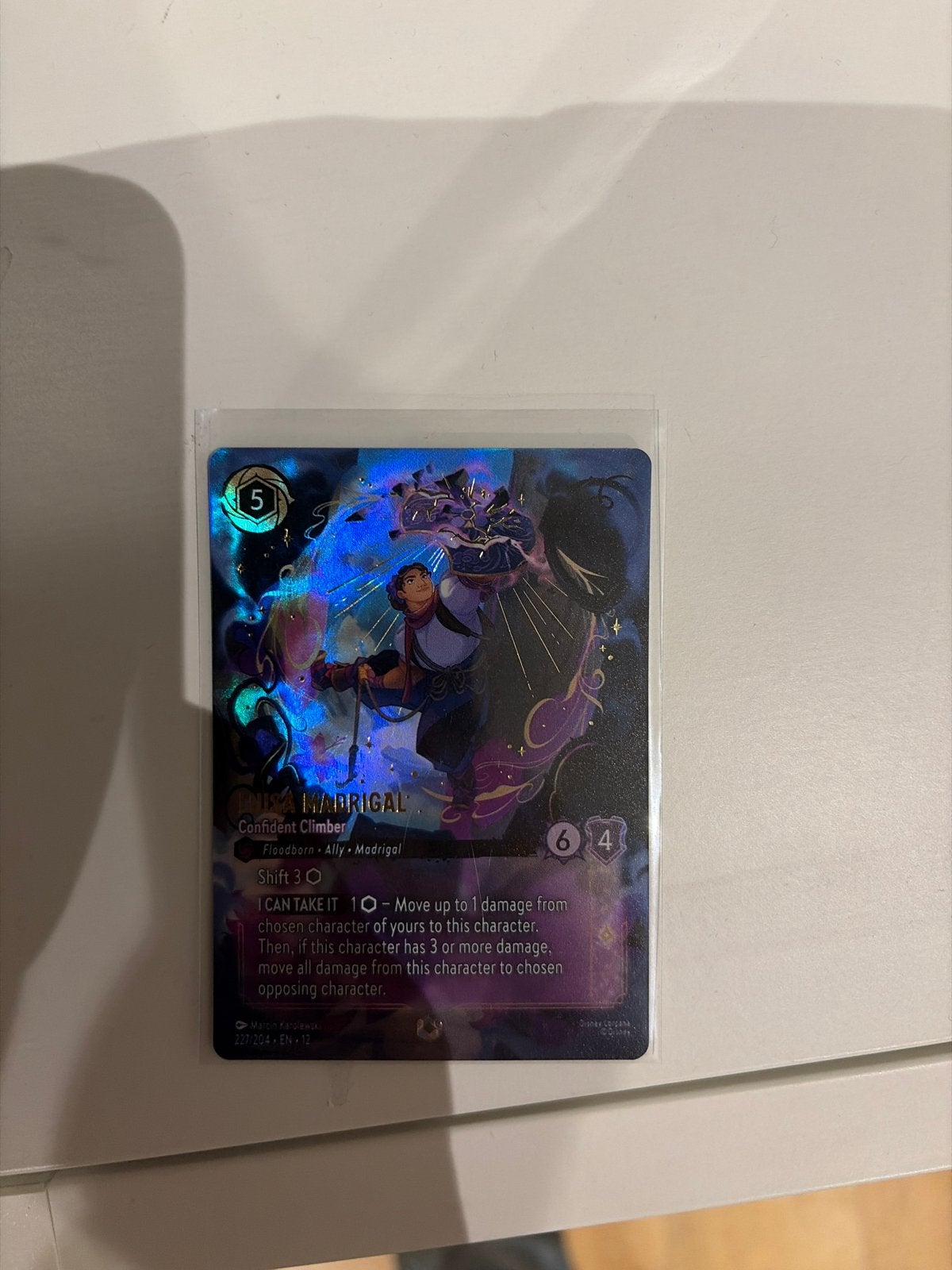 Lorcana TCG: Madrigal - Confident Climber (Foil), Ophalen of Verzenden, Zo goed als nieuw, Losse kaart, Foil