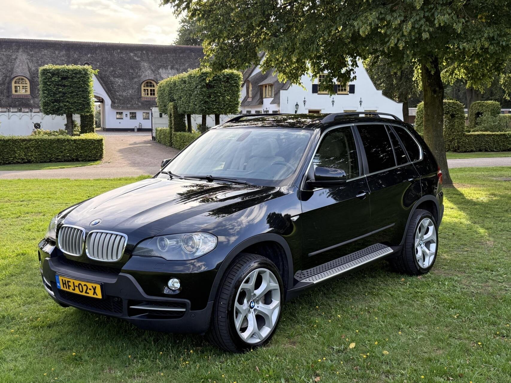 BMW X5 xDrive48i High Executive 160dkm 7-Persoons, Auto's, Gebruikt, Zwart, Leder, Bedrijf
