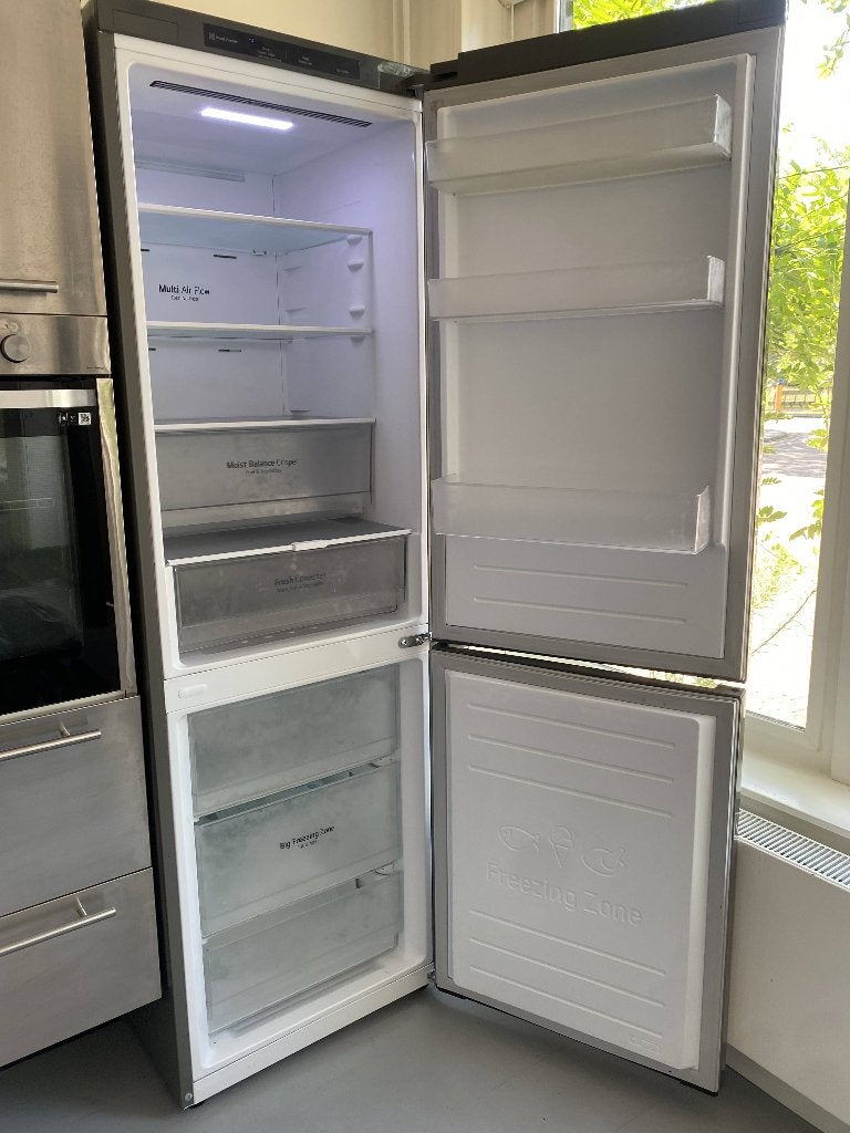 RVS LG vrijstaande koelvriescombinatie, Ophalen, Gebruikt, 200 liter of meer, Met aparte vriezer
