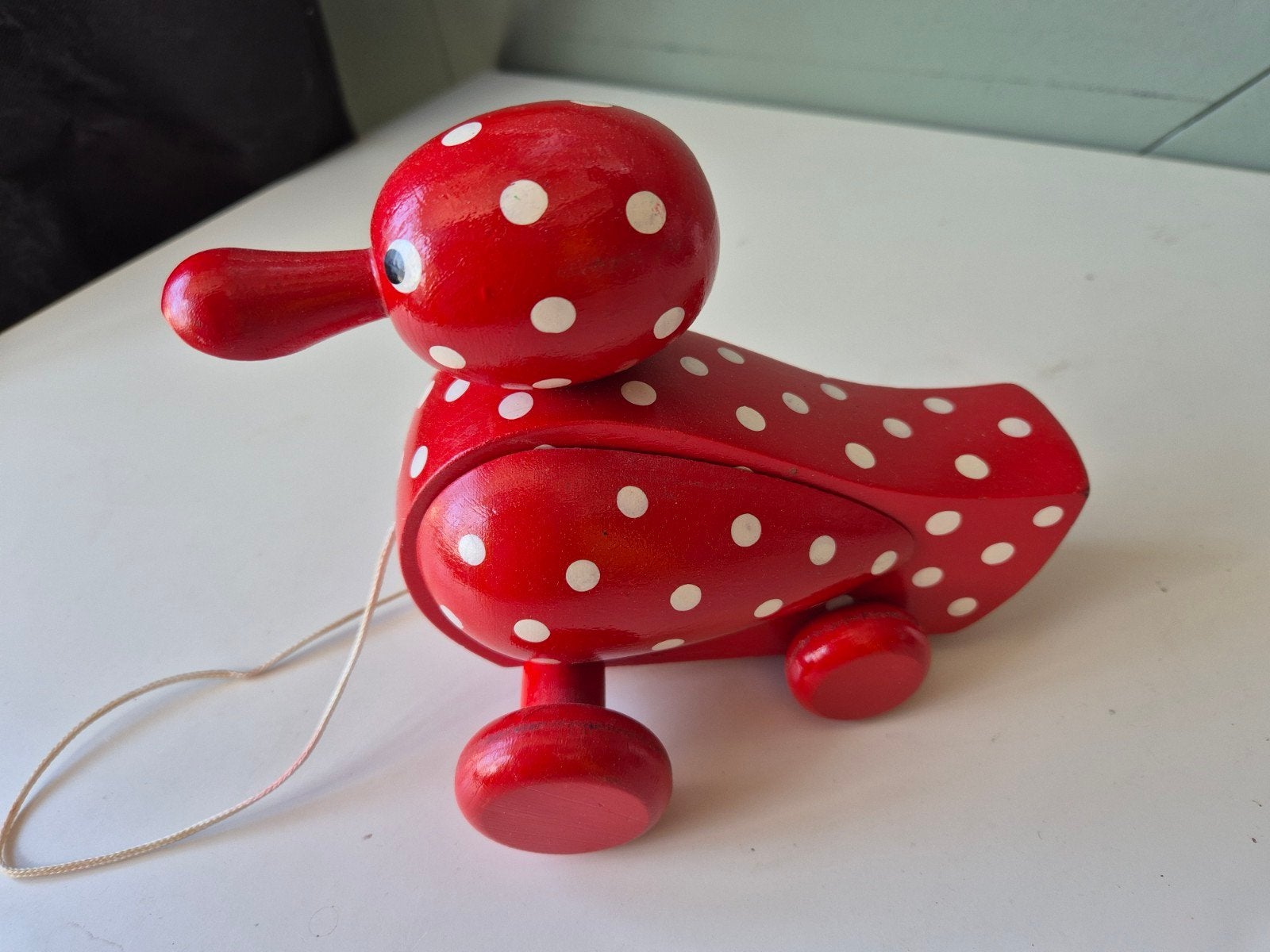 Trekeendje rood met witte stippen, Ophalen of Verzenden, Gebruikt, Duw- of Trekspeelgoed