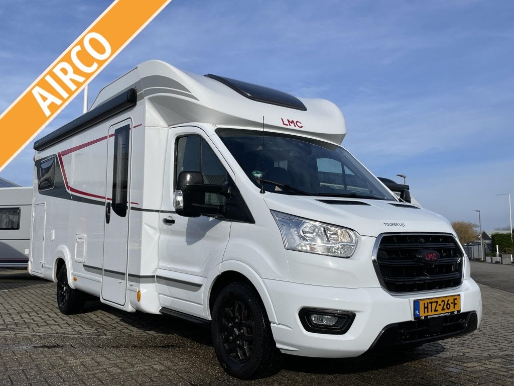 LMC Tourer Lift H 664 G AIRCO/FIETSENDRAGER/NAVI, Caravans en Kamperen, Campers, Automaat, Standaard zit, Ringverwarming, Luifel