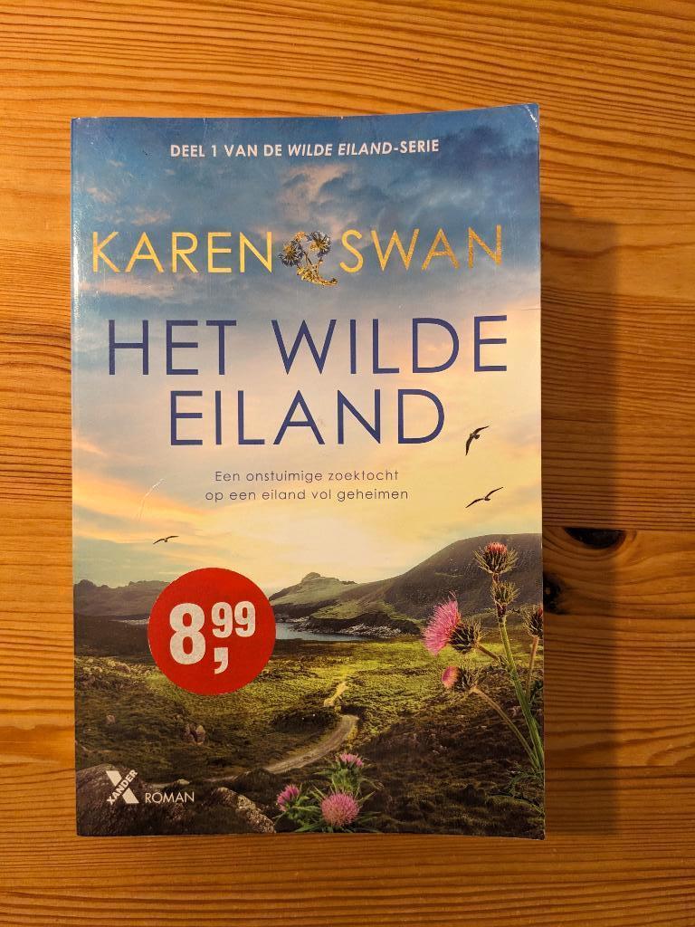 Het wilde eiland - Karin Swan (deel 1), Boeken, Romans, Zo goed als nieuw, Nederland, Ophalen of Verzenden
