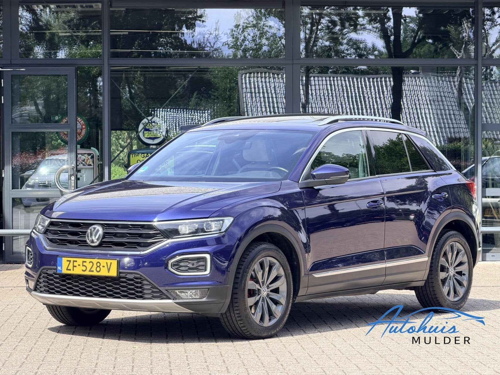 Volkswagen T-Roc 1.5 TSI Sport | Navi | Leer | Clima | Pano, Auto's, Volkswagen, Voorwielaandrijving, 4 cilinders, 150 pk, Blauw