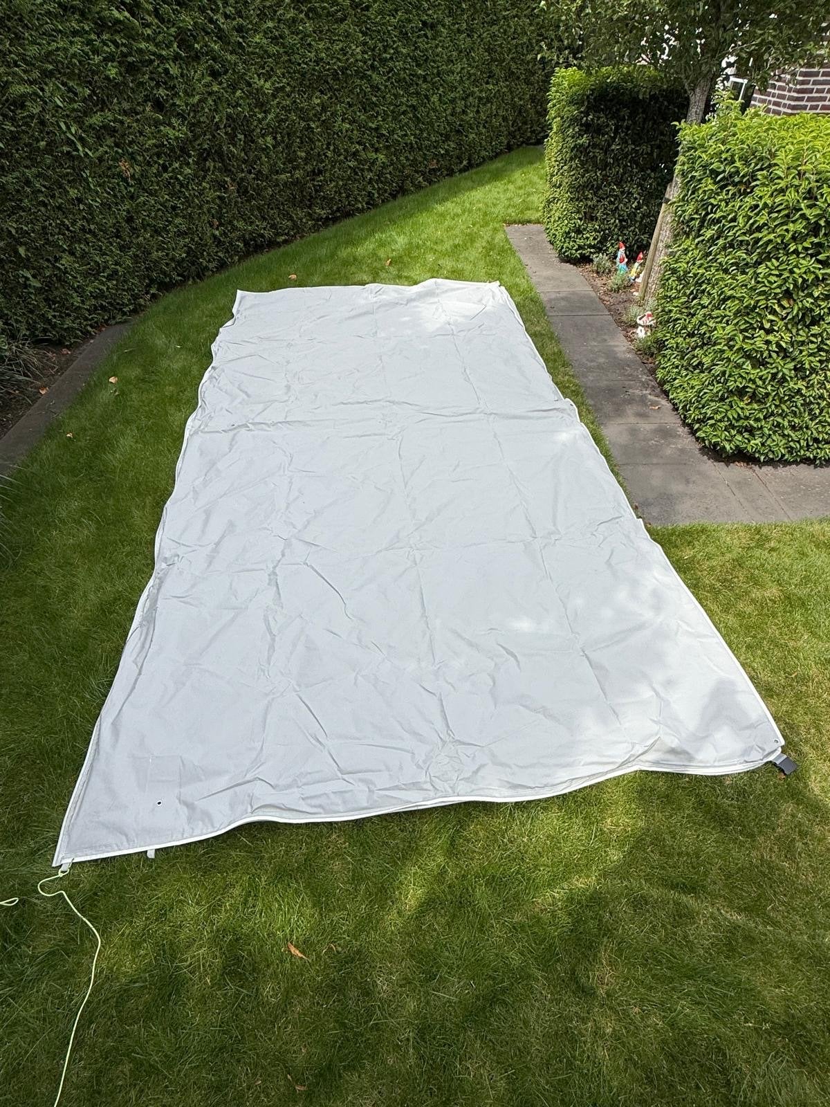 Luifel doek en stokken voor caravan - slechts 1 week gebruik, Caravans en Kamperen, Caravan accessoires, Ophalen, Zo goed als nieuw