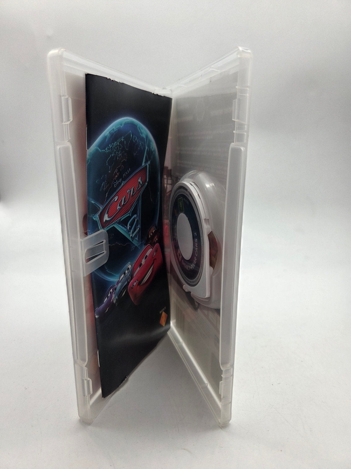 Cars 2 PSP Game - Disney Pixar Race Avontuur, Gebruikt, 10 Great Marlborough Street, London, W1F 7LP, UK, Racen en Vliegen, Vanaf 7 jaar