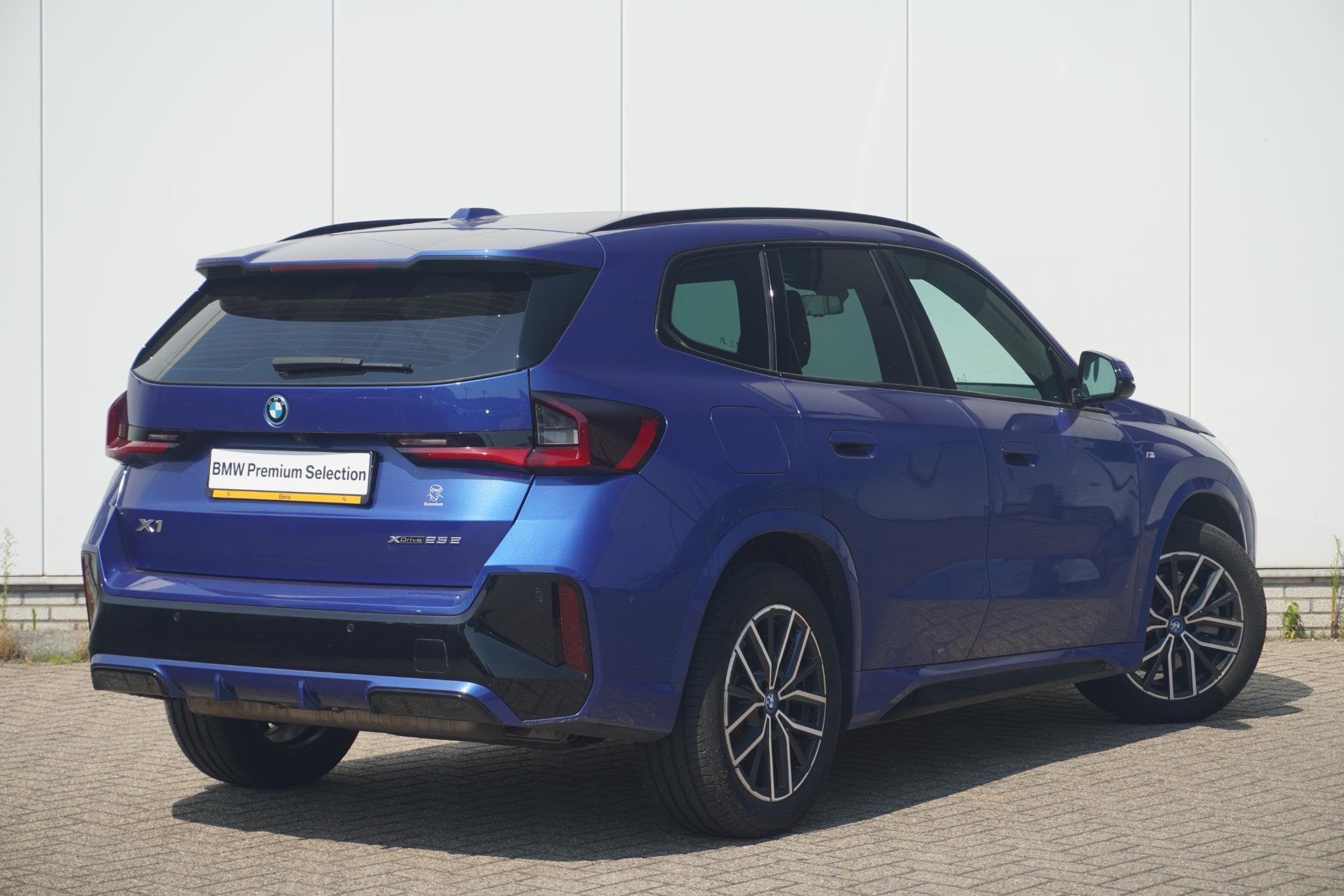 BMW X1 xDrive25e M Sport | Trekhaak | Stoelverwarming | Comf, Auto's, Stof, Gebruikt, Blauw, 105 min