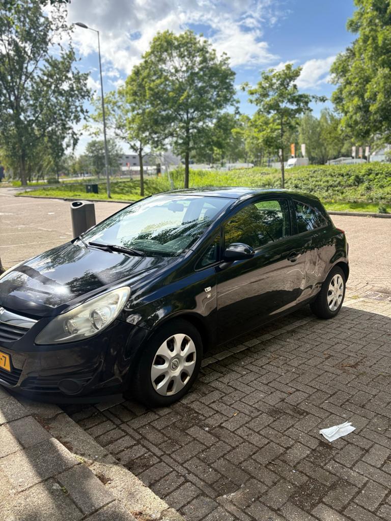 Opel Corsa 1.2 16V 3D 2010 Zwart, Auto's, Voorwielaandrijving, 40 €/maand, Zwart, 1229 cc