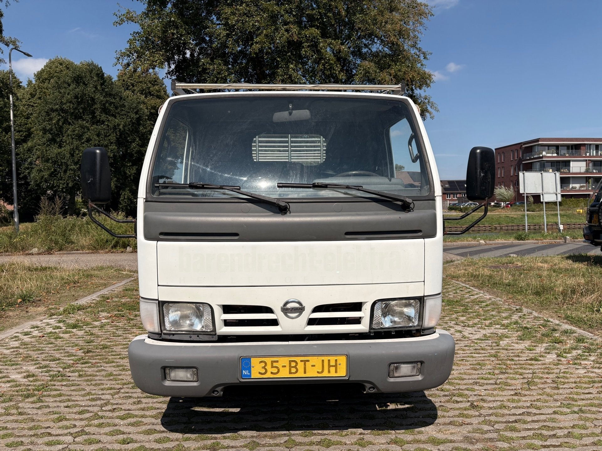 Nissan Cabstar E 105.32-340 3.0TD - openlaadbak - nieuwe apk, Auto's, 1940 kg, Achterwielaandrijving, Gebruikt, 2953 cc