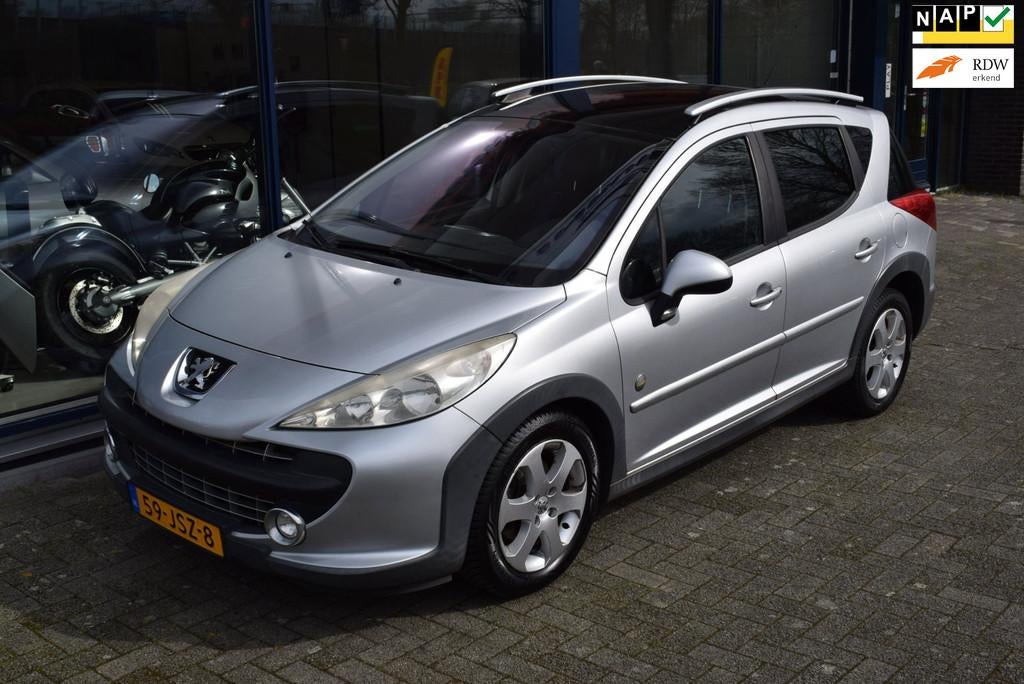 Peugeot 207 SW Outdoor 1.6 VTi Sublime, Auto's, Gebruikt, Zwart, 4 cilinders, Leder en Stof