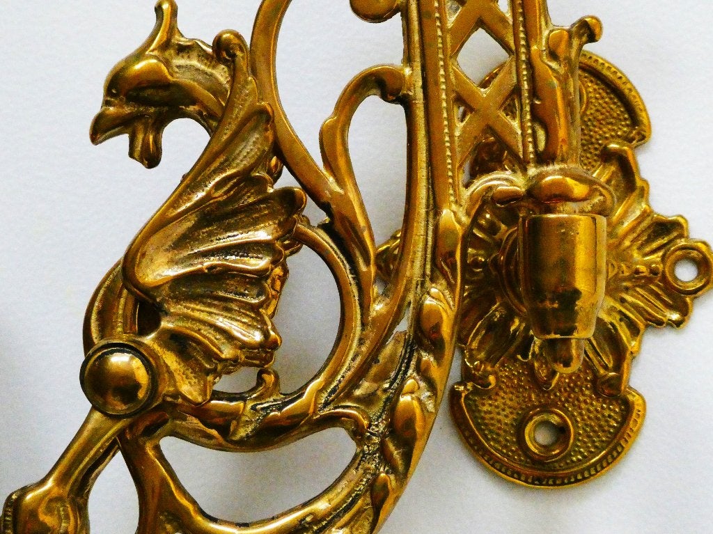 2 Wandkandelaars / pianokandelaars kandelaar met griffioen, Antiek en Kunst, Antiek | Kandelaars, Ophalen of Verzenden, Koper of Brons