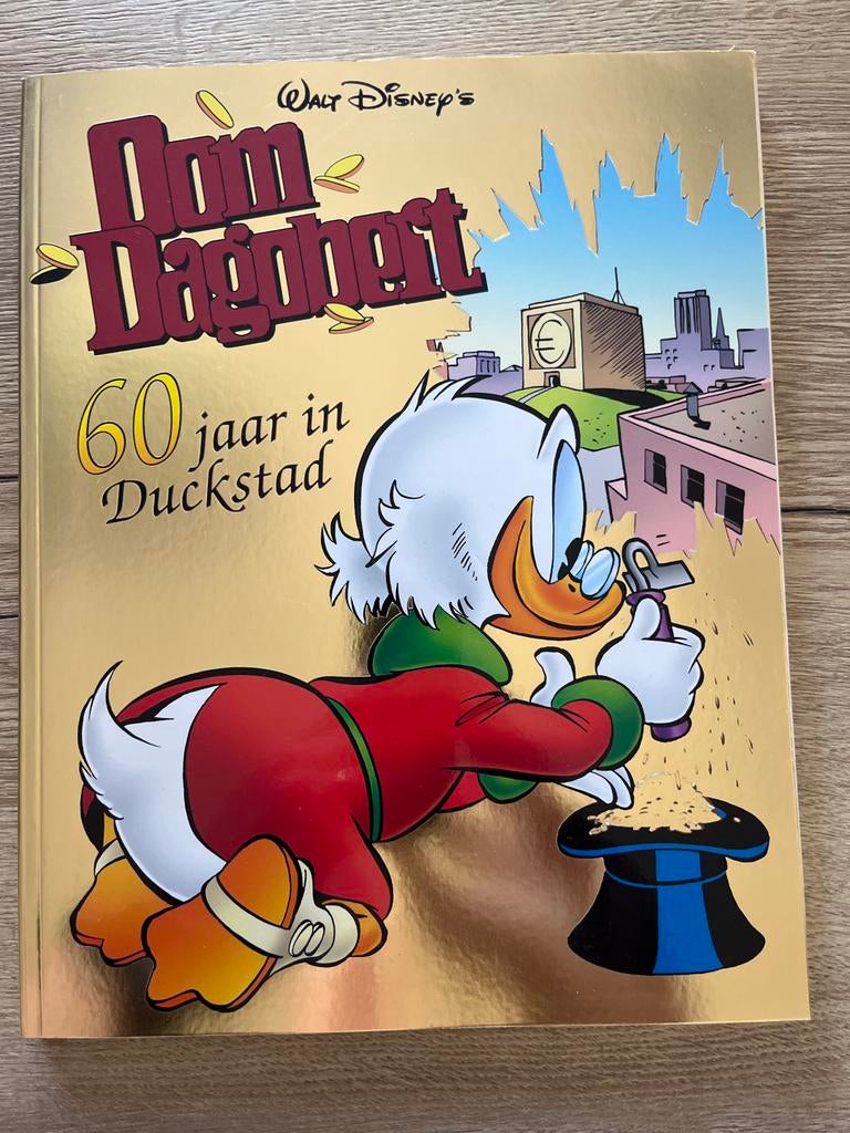Oom Dagobert: 60 jaar in Duckstad - Speciale uitgave, Boeken, Stripboeken, Eén stripboek, Ophalen of Verzenden, Zo goed als nieuw