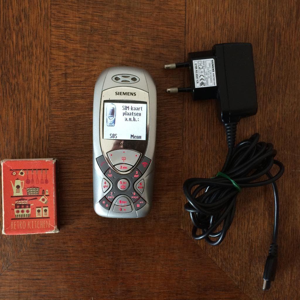 Siemens MC60 klein zilver mobiel telefoontje met oplader, Gebruikt, Ophalen of Verzenden, Klassiek of Candybar, Zonder simlock
