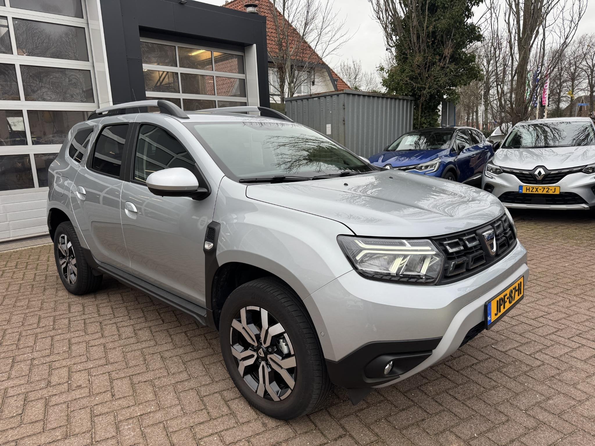 Dacia Duster 1.3 TCe 150pk EDC Prestige 14.297km!, Auto's, Dacia, Stof, Gebruikt, Euro 6, 4 cilinders