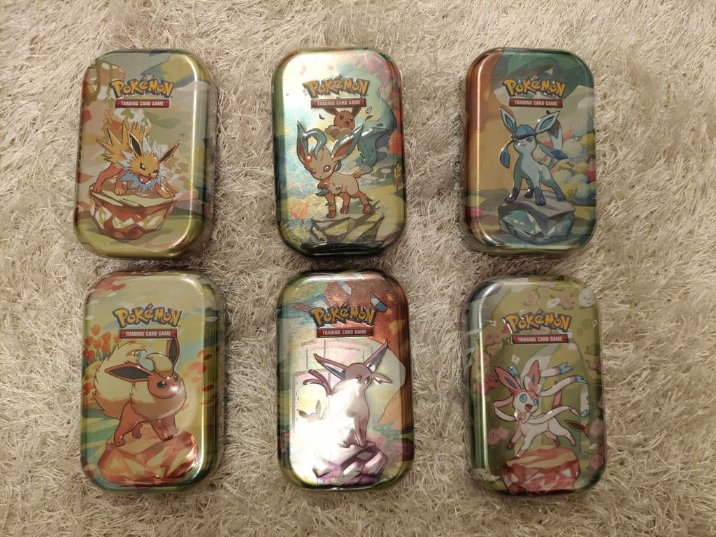 Sealed Pokemon Prismatic Evolution Tin ENG, Ophalen of Verzenden, Nieuw, Overige typen