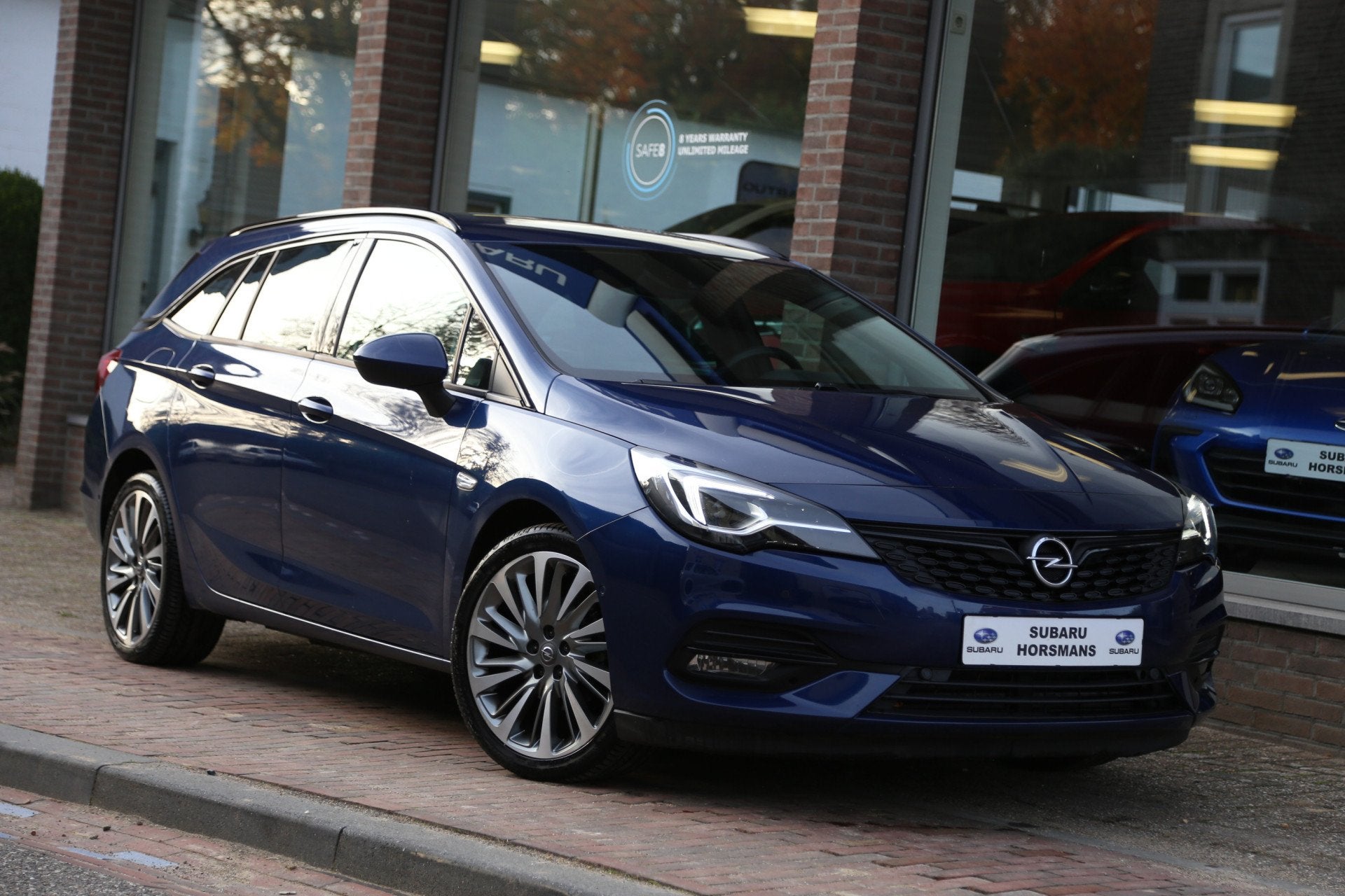 Opel Astra Sports Tourer 1.2 Launch Edition Navi BOSE Camera, Voorwielaandrijving, Bluetooth, Gebruikt, Euro 6
