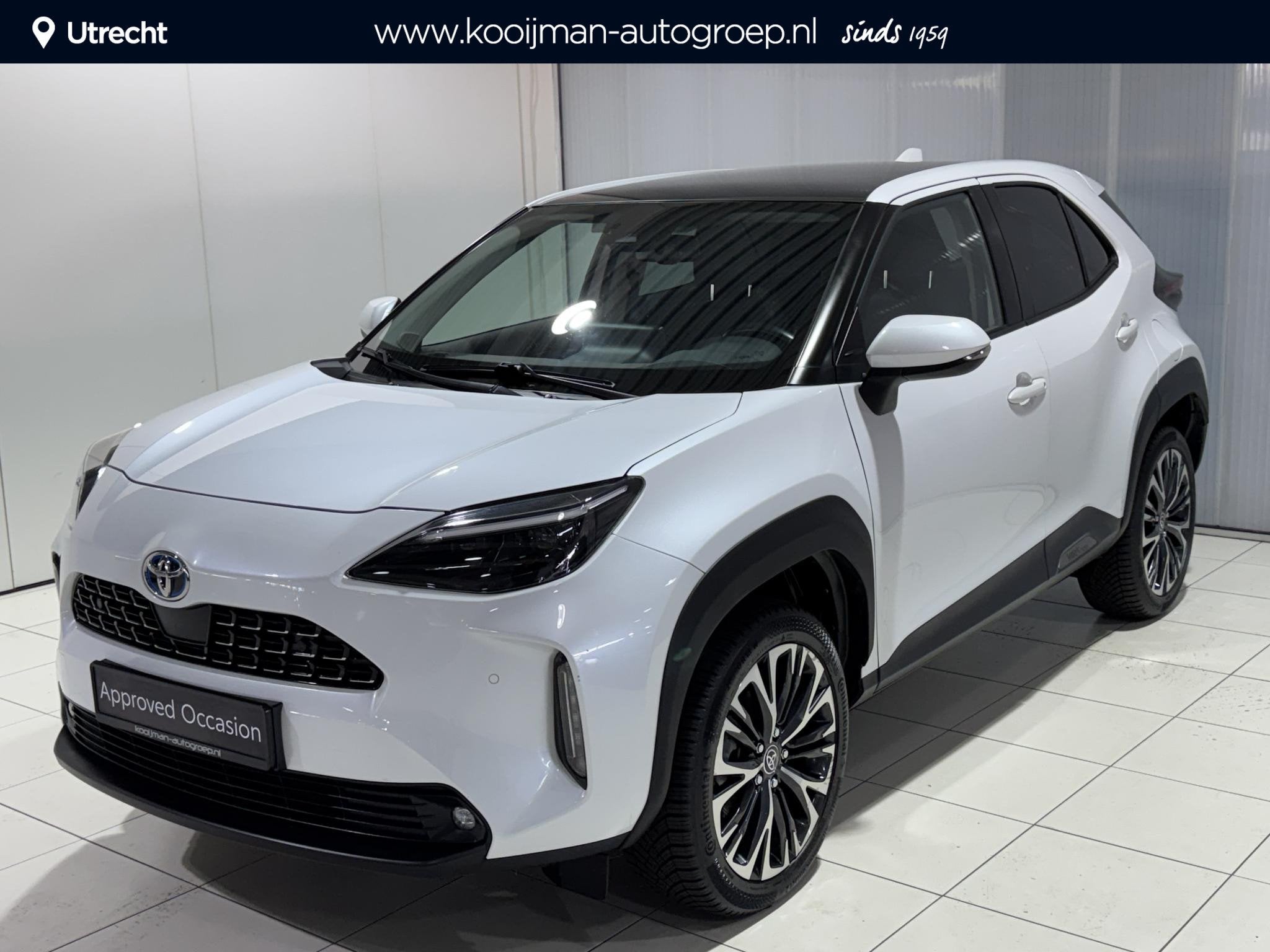 Toyota Yaris Cross 1.5 Hybrid Executive Panoramadak, Stoelve, Auto's, Gebruikt, Wit, 1490 cc, Bedrijf