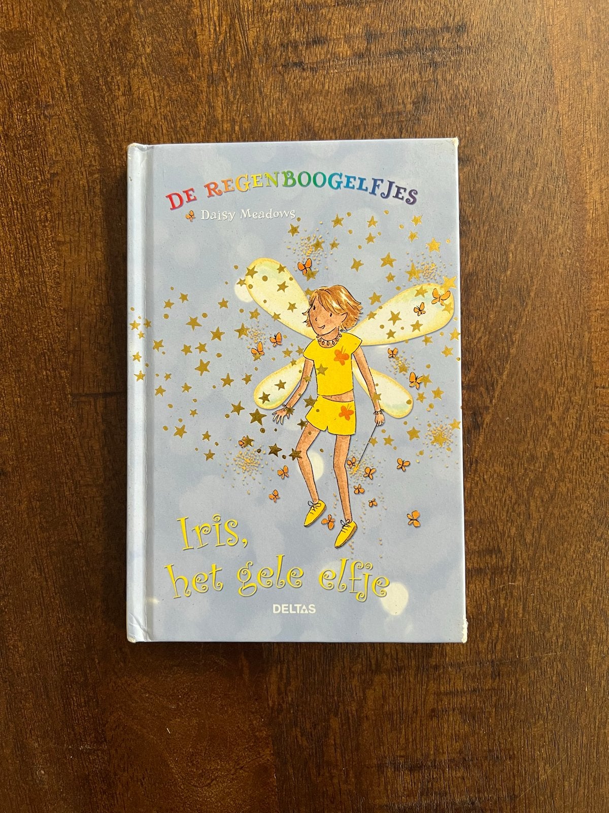 De Regenboogelfjes: Iris, het gele elfje - Daisy Meadows, Ophalen of Verzenden, Gelezen, Daisy Meadows