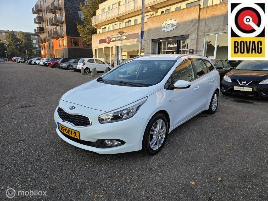 Kia cee'd Sportswagon 1.4 CVVT 2014 CRUISE/AIRCO/BLUETOOTH!, Auto's, Voorwielaandrijving, Euro 5, Gebruikt, Zwart