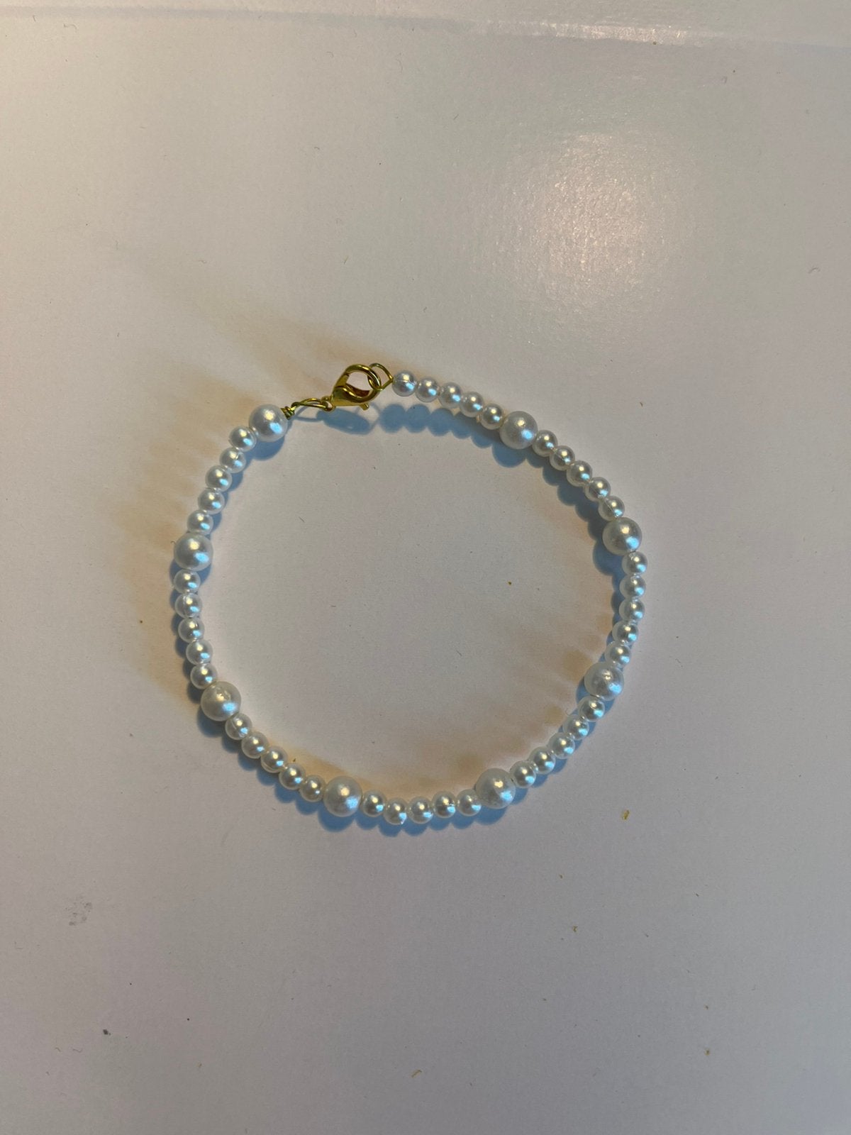 Parels armband, Ophalen of Verzenden, Zo goed als nieuw, Goud