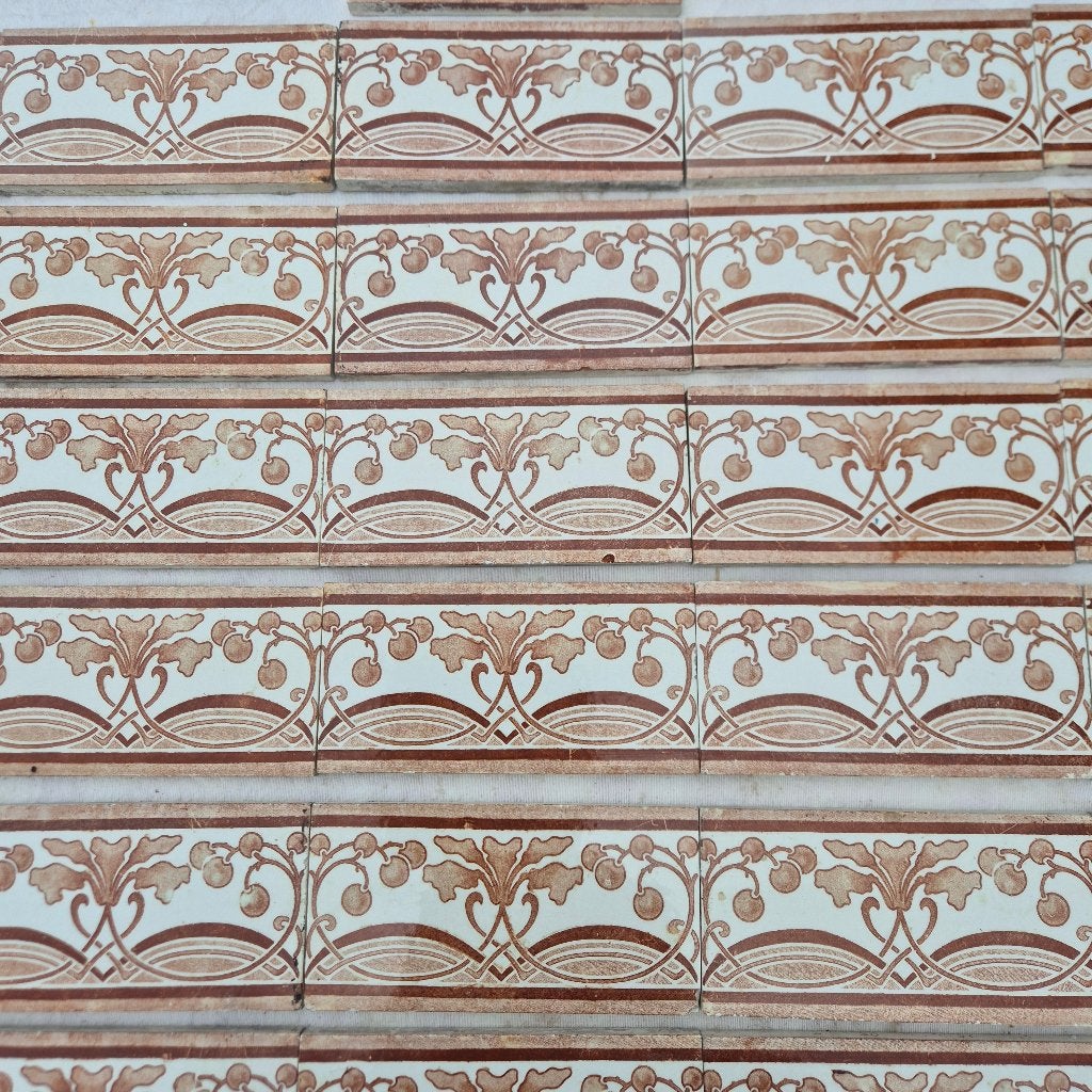 31 art nouveau randtegels roodbruin decor 15x7,5cm, Ophalen