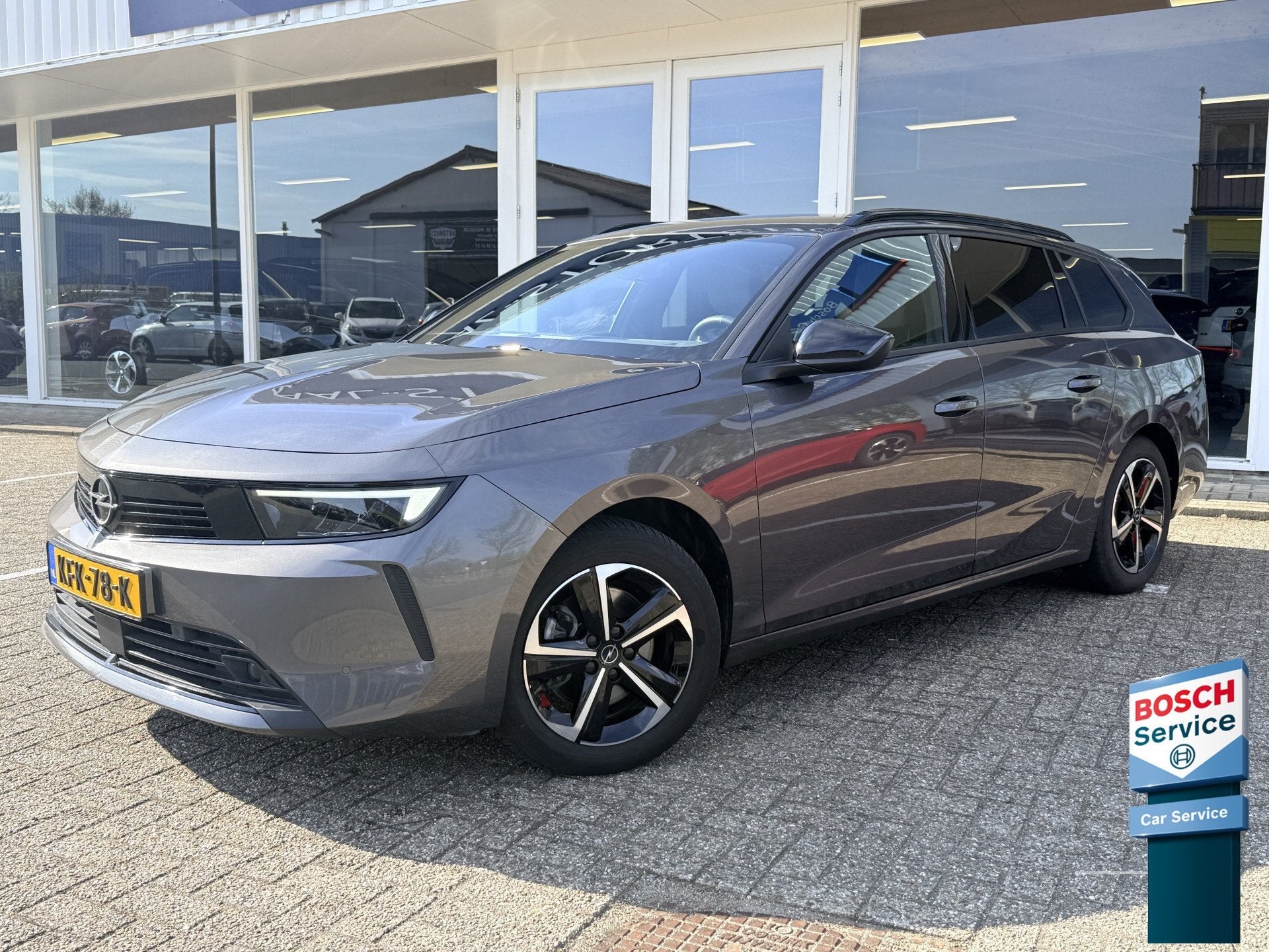 Opel Astra Sports Tourer 1.2 Turbo Hybrid Business Edition |, Auto's, Opel, 136 pk, 1199 cc, Leder en Stof, Hybride Elektrisch/Benzine