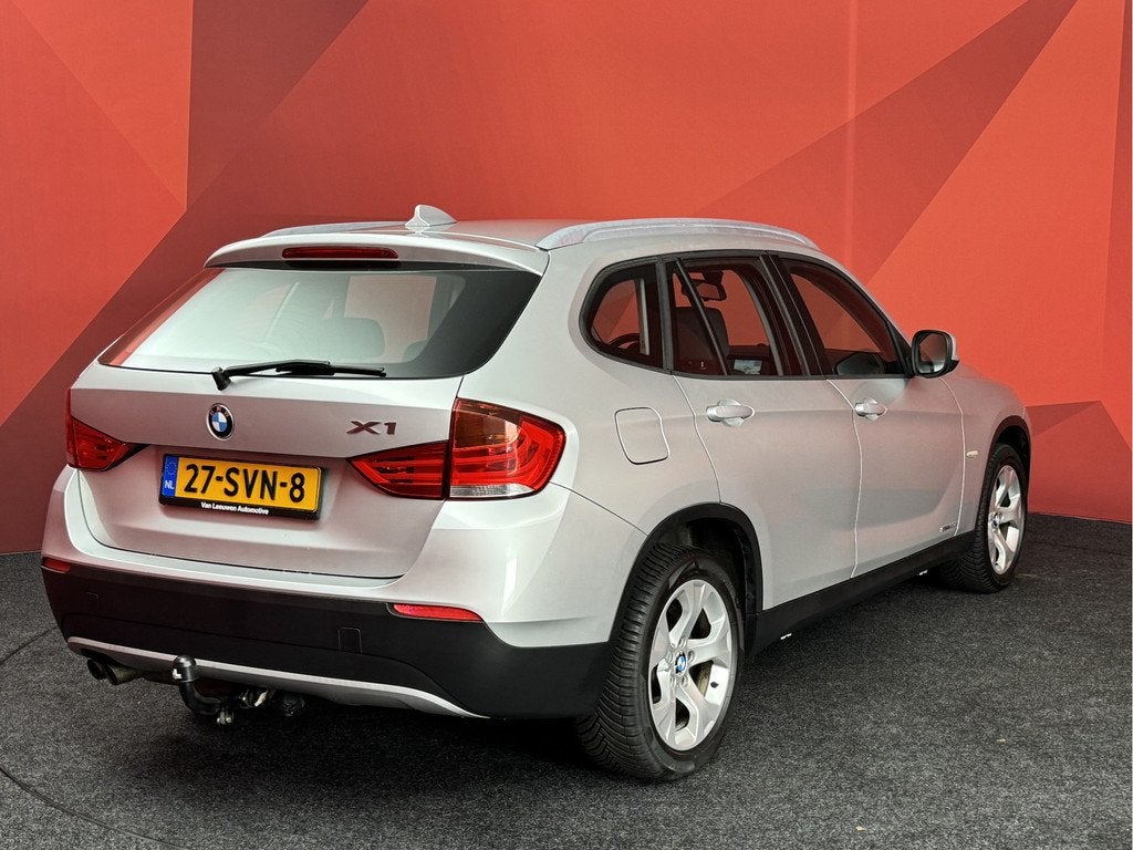 BMW X1 sDrive20i Business | Trekhaak | Cruise Control | Navi, X1, Euro 5, Zwart, 4 cilinders
