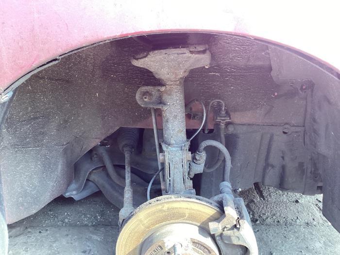 Schokdemper rechts-voor van een Suzuki Alto, Auto-onderdelen, Ophanging en Onderstel, Suzuki, Gebruikt, 3 maanden garantie, Ophalen of Verzenden