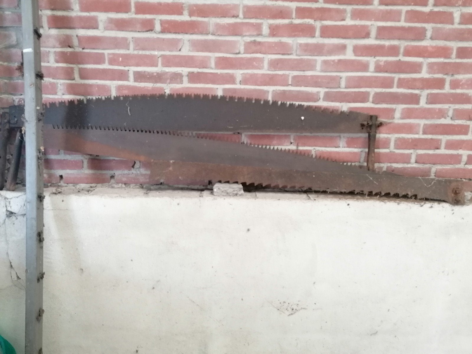 Oude zaag voor 2 personen., Ophalen