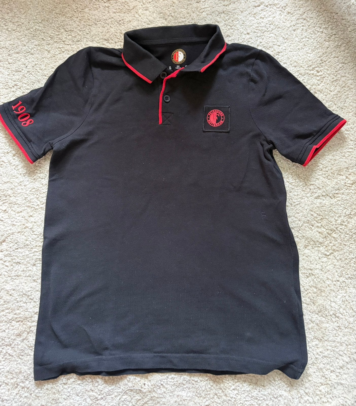 Feyenoord polo junior, Kinderen en Baby's, Ophalen of Verzenden, Zo goed als nieuw, Jongen, Shirt of Longsleeve