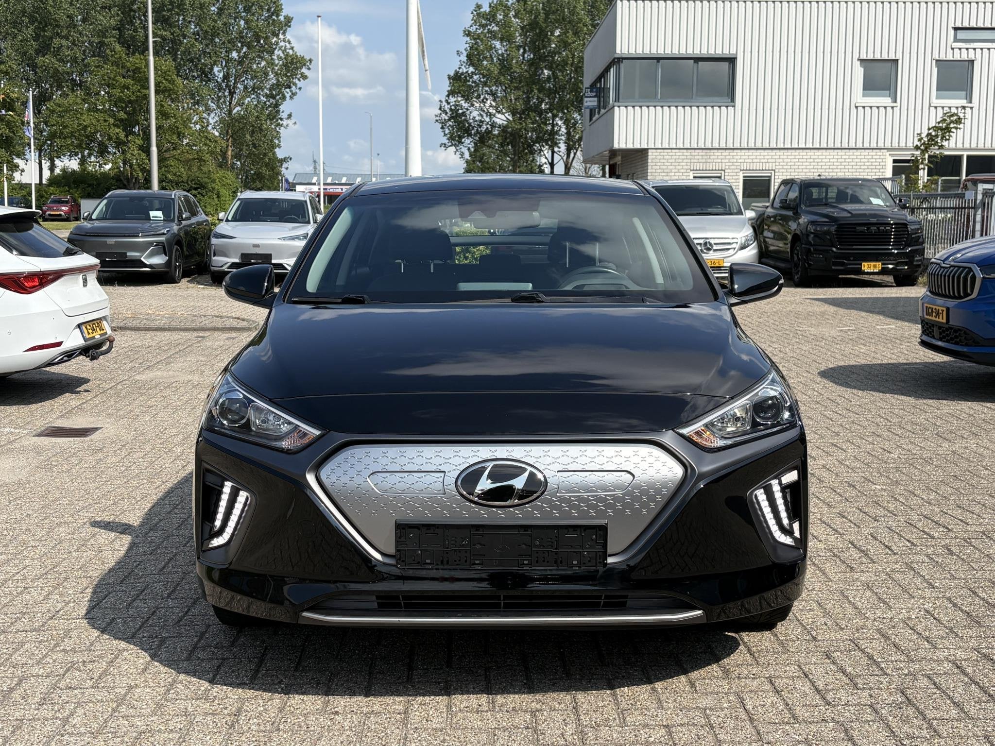 Hyundai IONIQ i-Motion EV 38 kWh 46.300 KM | SOH 95,6% | Nav, Auto's, Hyundai, Gebruikt, Zwart, IONIQ, 294 km