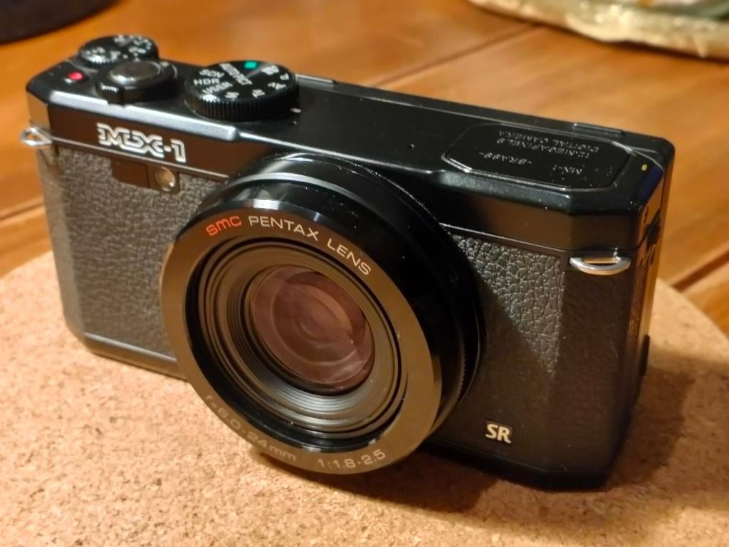 Pentax MX-1 zwart met 157 clicks, 12 Megapixel, Compact, Ophalen of Verzenden, Zo goed als nieuw