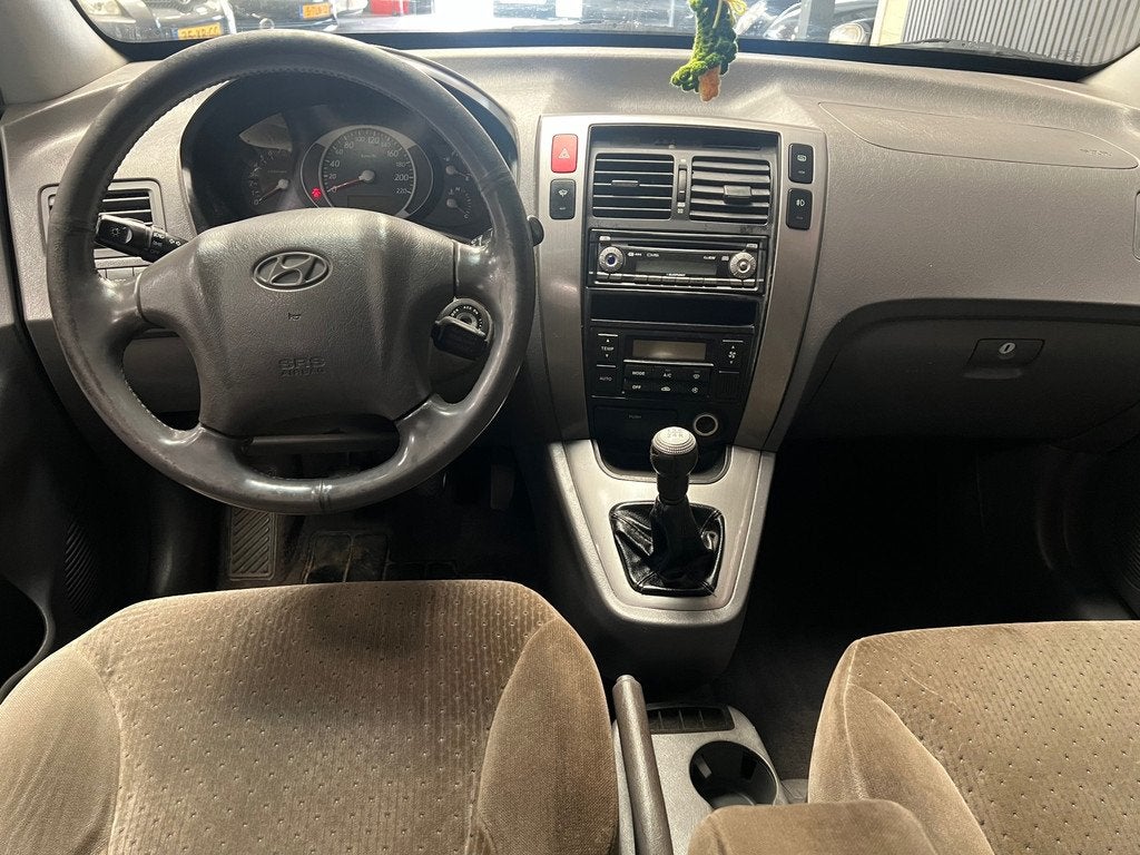 Hyundai Tucson 2.0i 4WD Style 2e eigenaar NAP - Airco, Gebruikt, 4 cilinders, Bedrijf, Handgeschakeld