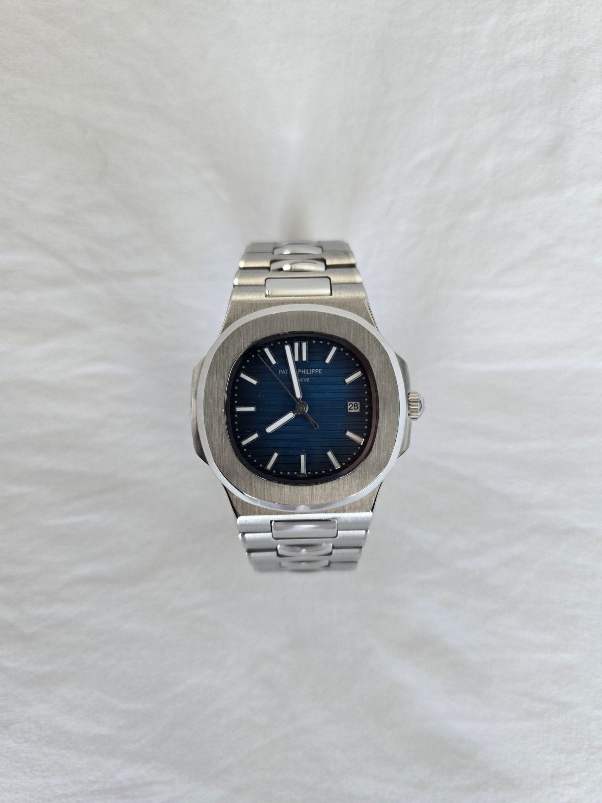 Patek Philippe Nautilus in nieuwstaat, Sieraden, Tassen en Uiterlijk, Horloges | Heren, Overige merken, Staal, Staal, Polshorloge