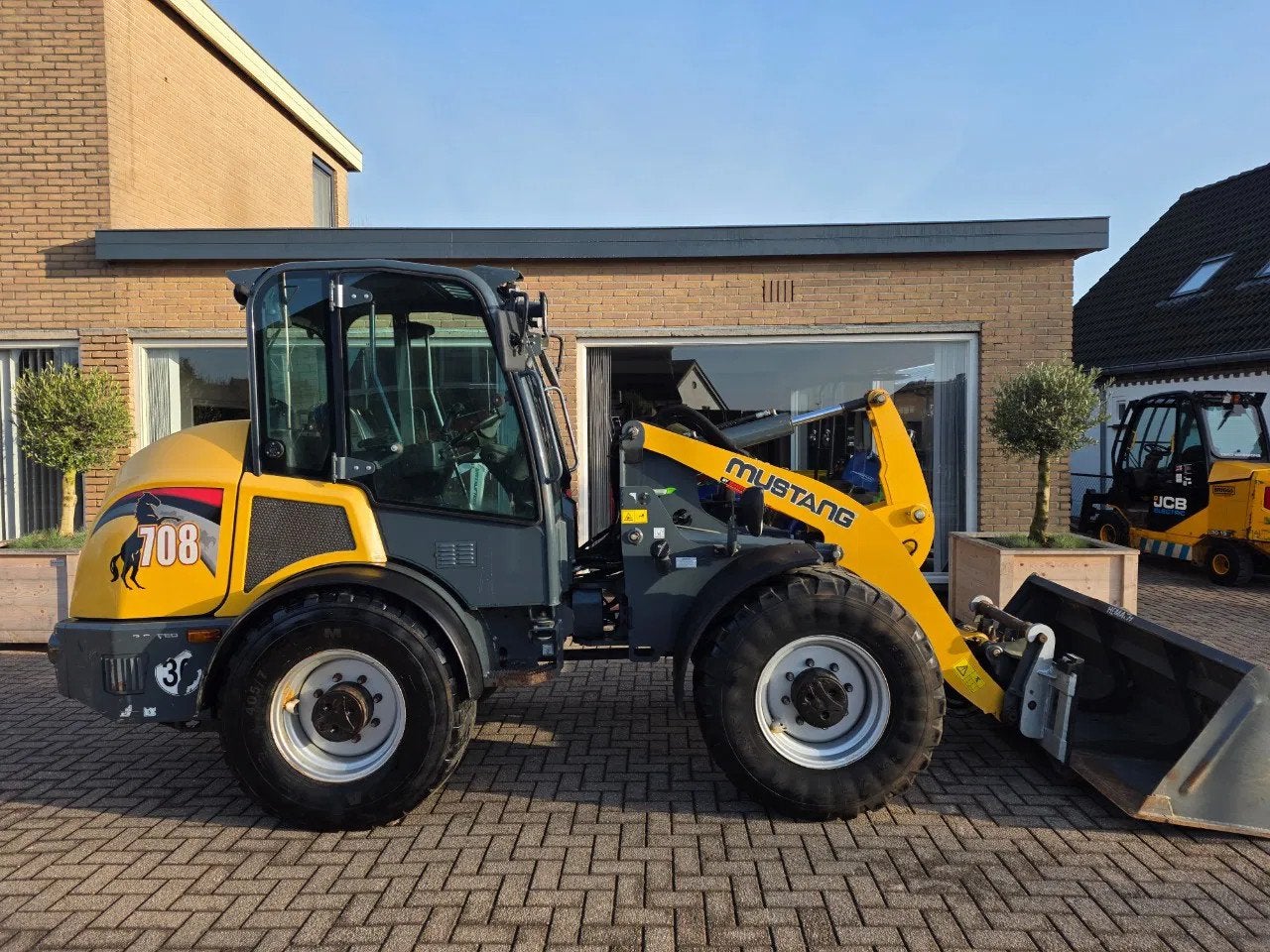Mustang 708 shovel bak en lepels (bj 2018), Zakelijke goederen, Wiellader of Shovel