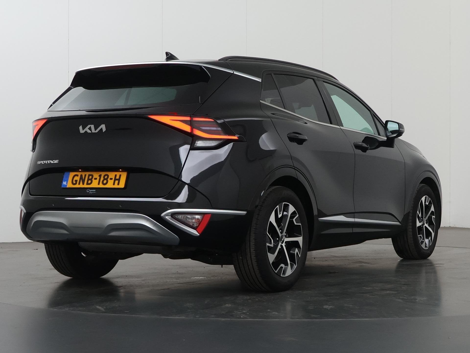 Kia Sportage 1.6 T-GDi MHEV DCT7 DynamicPlusLine | Panoramad, Auto's, Gebruikt, 4 cilinders, Leder en Stof, Zwart