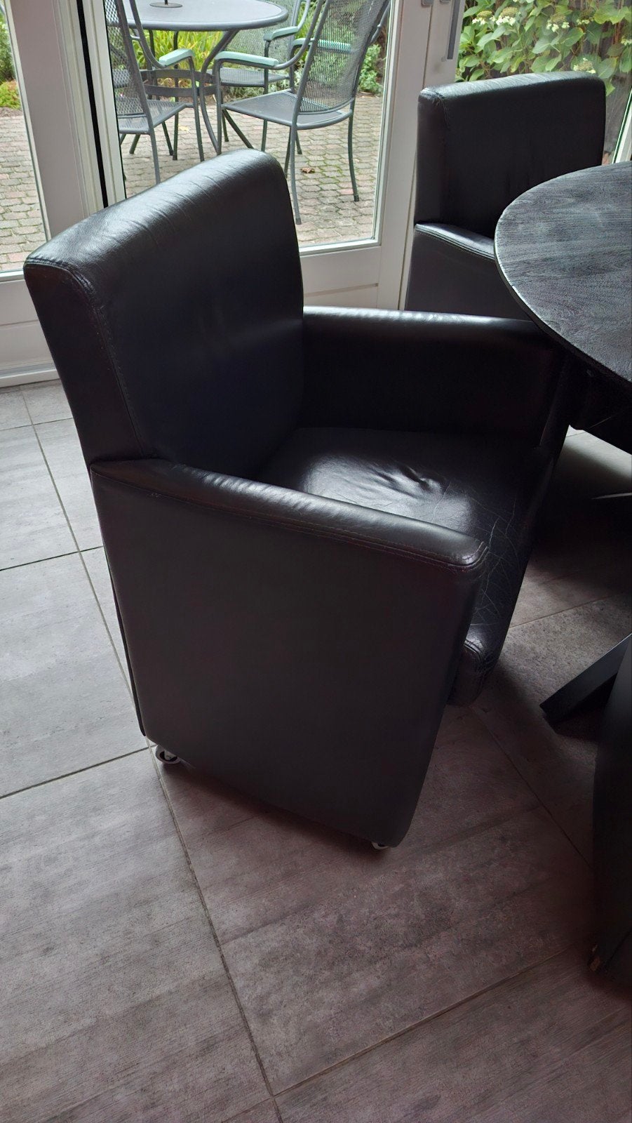 4 leren eetkamerstoelen met wieltjes, Ophalen, Gebruikt, Zwart, Leer