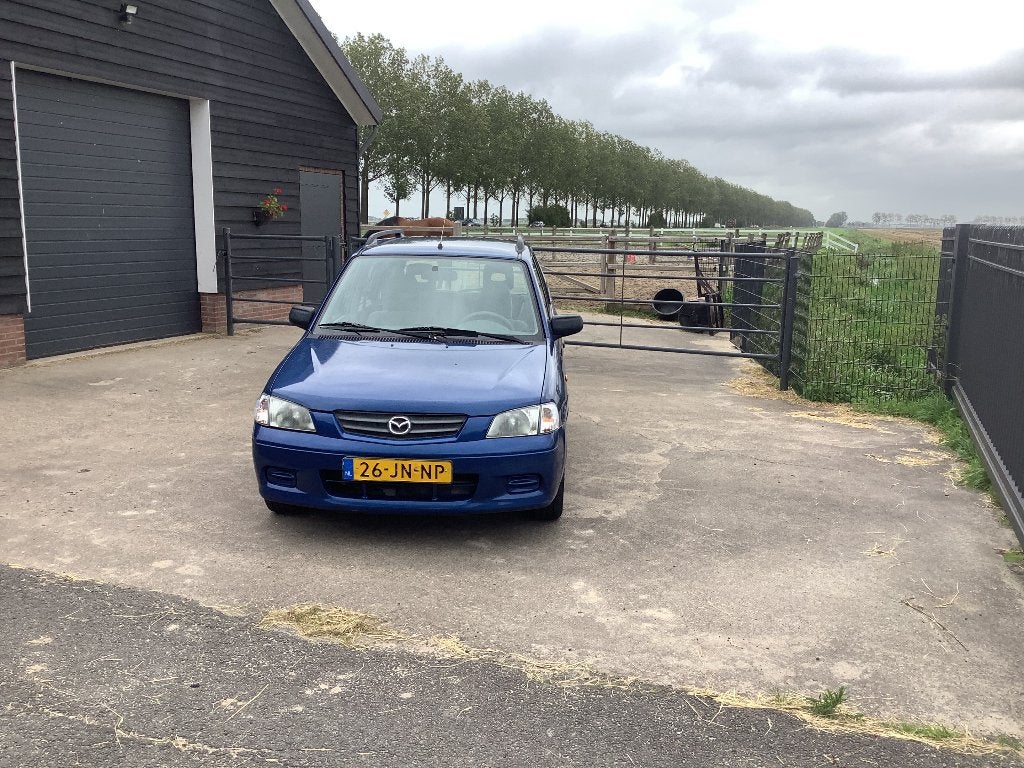 Mazda Demio 1.3 Comfort 2002 Blauw, Auto's, Voorwielaandrijving, 410 kg, 31 €/maand, Blauw