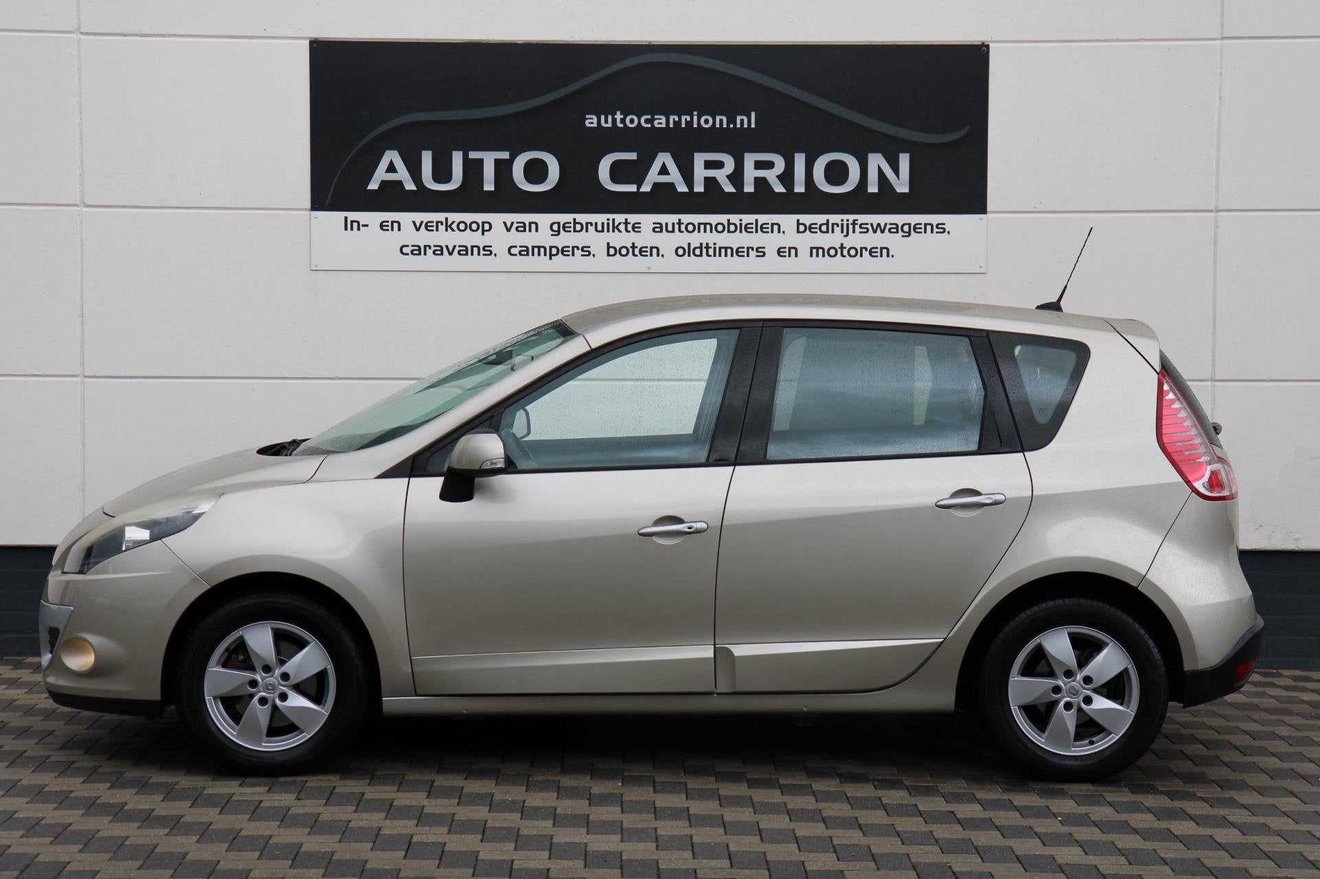 Renault Scénic 2.0 140PK Dynamique Airco Cruise Navi NAP AP, Auto's, Renault, Zwart, 4 cilinders, Leder en Stof, Beige