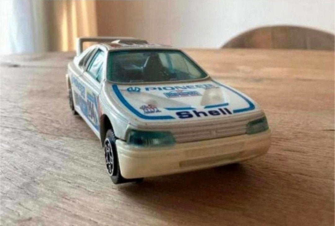 Peugeot 405 Rally Pioneer / Shell – Bburago 1:43, Hobby en Vrije tijd, Modelauto's | 1:43, Ophalen of Verzenden, Zo goed als nieuw