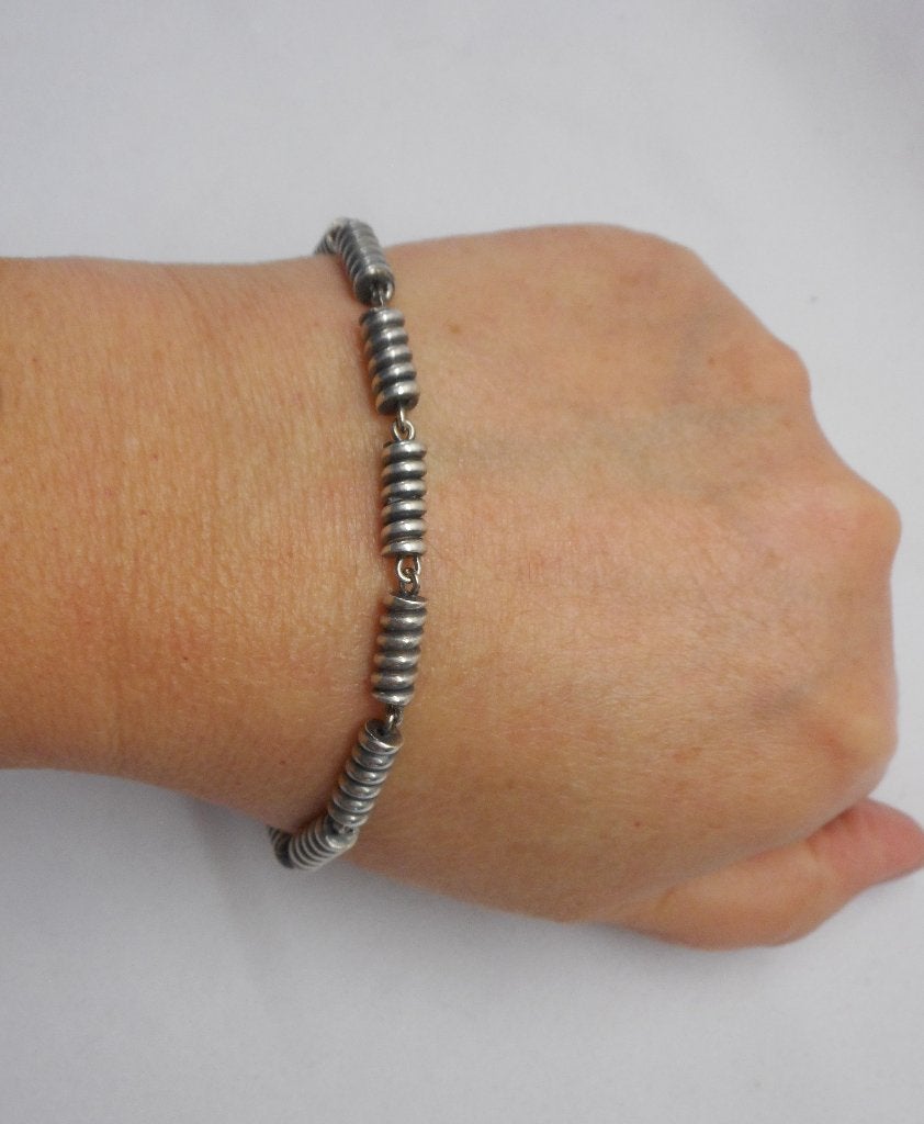 Zilveren wokkelschakel armband nr.576