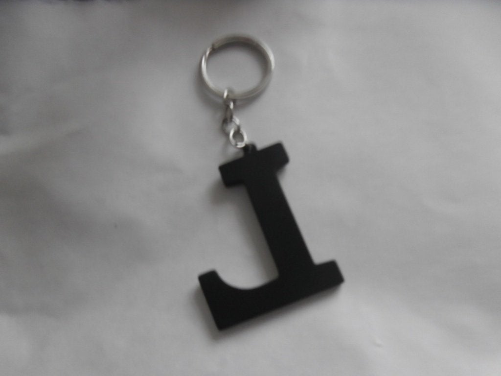sleutelhanger zwart met letter L kunststof, Ophalen of Verzenden, Nieuw, Overige typen
