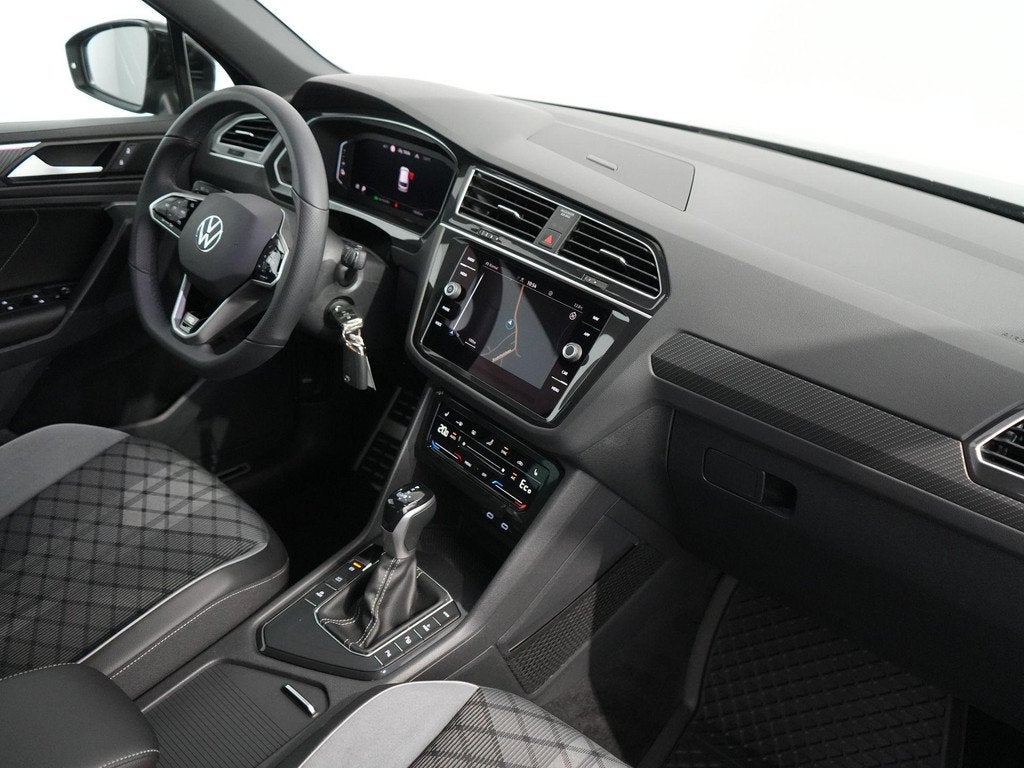 Volkswagen Tiguan 1.4 TSI eHybrid R-Line Business+ 3x R-line, Auto's, Volkswagen, Stof, Euro 6, 4 cilinders, Zwart