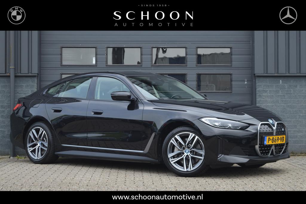 BMW i4 eDrive40 84 kWh | ACC | 360 CAM | HIFI | (bj 2022), Auto's, BMW, Achterwielaandrijving, Gebruikt, Zwart, Met garantie (alle)